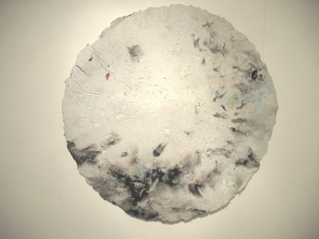 ‘Untitled Planet PSB 51 A’, pulped materials: Collins World Atlas, ‘The Conservative Manifesto 2010’, ‘An Engine, Not a Camera: How Financial Models Shape Markets by Donald MacKenzie; Acrylic; Indian ink&nbsp;(2014)